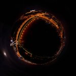 Hrejivé farby nočných svetiel hlavného mesta Slovenska na panoráme z dronu